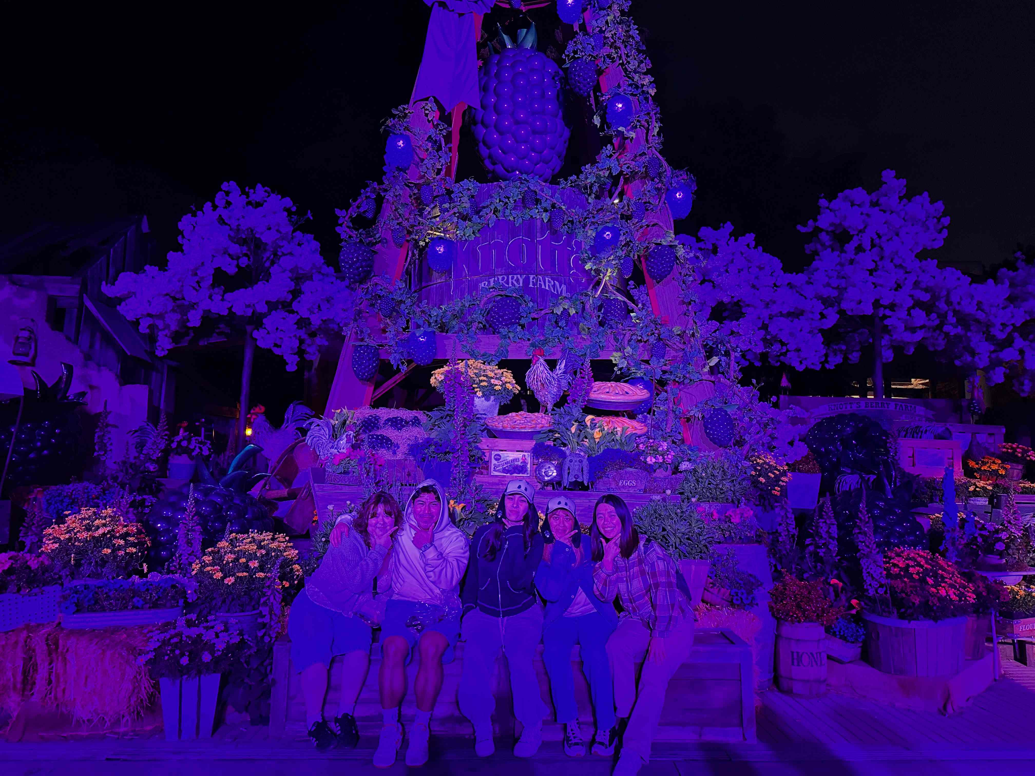 Friends at Knott's Berry Farm with purple lighting